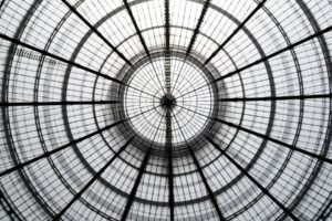 stock-photo-double-exposure-photo-of-transparent-circular-glass-ceiling-roof-at-two-different-zooms-361421438 by . 