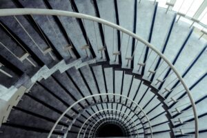 stock-photo-spiral-staircase-in-modern-building-151773965 by . 